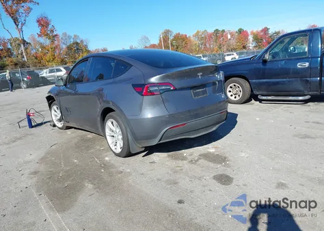 2023 Tesla Model Y Awd/Long Range Dual Motor All-Wheel Drive z USA, uszkodzony, nr VIN 7SAYGDEE7PA147213